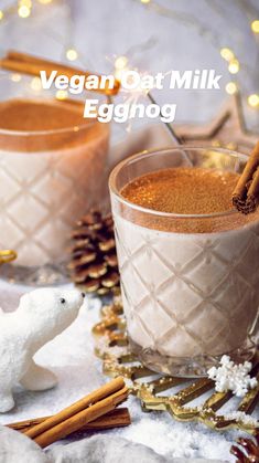 vegan oat milk eggnog in glasses with cinnamon sticks on the side