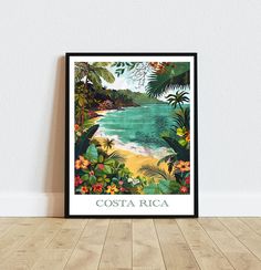 the costa rica travel poster is displayed on a wall in front of a wooden floor