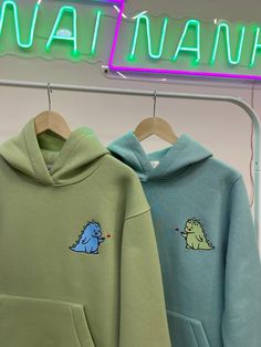 Couple cartoon embroidered hoodies/crewneck sweatshirts with dinosaurs/dino/t-rex/dragon character. It's an original creative idea for Anniversary, New Year, St.Valentine's, Christmas or Birthday matching gift. ------------------------------------------------------ * ORDER INFORMATION * 1) You can see the price for 1 item in the listing. 2) To order the couple set - put 2 items with their individual parameters to the cart separately, please. Also, you can order just one item - leave a note about Couple Sweaters Matching, Dinosaur Hoodies, Dinosaur Couple, Dragon Dinosaur, Couple Embroidery, Dino Hoodie, Best Friend Hoodies, Dragon Character, Dino Design