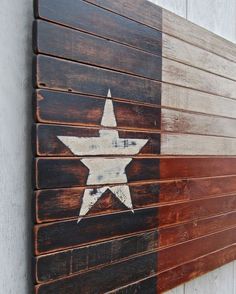 the texas flag painted on a wooden wall