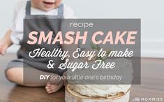 a baby sitting on the floor next to a cake with words overlay reading recipe smash cake