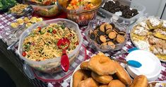 a table filled with lots of different types of food