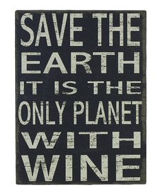 a sign that says save the earth it is the only planet with wine