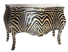 a zebra print chest with two drawers