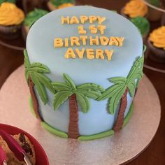 Isabelsicedcakes on IG- Blue fondant Palm tree Monkey theme first birthday cake Palm Tree Birthday Cake, Fondant Palm Tree, Hawaiian Party Cake, Hawaiian Cookies, Fondant Cakes Birthday, Turtle Cookies