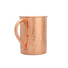 a copper colored mug with handle on a white background