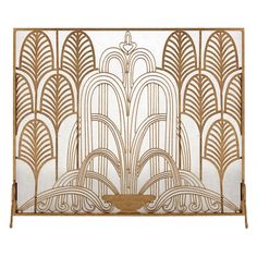 an art deco style fireplace screen in gold and white