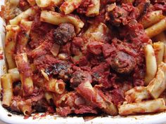 pasta with meat and sauce in a casserole dish