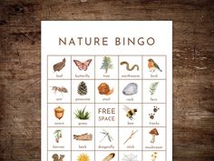 a printable nature bingo game on a wooden table with leaves, mushrooms and other items