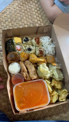 a box filled with lots of different types of food