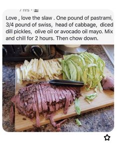 a cutting board topped with sliced up meat and veggies next to a knife