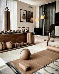 a living room filled with lots of exercise equipment