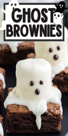 there are brownies with white frosting on them and ghost faces in the middle