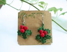 small crocheted holly earrings with red berries