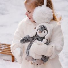 Meet the perfect winter companion—a soft, huggable penguin plush dressed in a cozy, removable mini polar bear aviator hat. This charming toy makes for an adorable pairing with your little one, who can match in a baby-sized polar bear knit hat. Together, they'll be ready for frosty adventures and endless cuddles. 100% polyester plush Includes plush toy with hat Machine wash delicate (In mesh bag), Do not bleach, Do not tumble dry, Do not Iron, Do not dryclean Arctic Penguins, Blanket Shawl, Aviator Hat, Personalized Hats, Baby Gift Sets, Mesh Bag, Baby Size, Hat Shop, Personalized Accessories