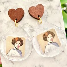 Princess Leia Star Wars Sticker Acrylic Earrings For Sale! These Earrings Are Absolutely Adorable. They Are Handmade By Me With Resin. Each Earring Has A Star Wars Sticker In It. They Are About 2 Inches Tall And About 1 1/2 Inches Wide. They Are From My Boutique, And Are Absolutely Cute And One Of A Kind! Such Cute Earrings To Add To Your Disney Or Jewelry Collection! Star Wars Stickers, Leia Star Wars, Jewelry Making Business, Princess Leia, Acrylic Earrings, Cute Earrings, Jewelry Collection, Star Wars, Jewelry Earrings