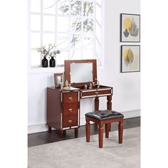 a wooden vanity with mirror and stool in a room