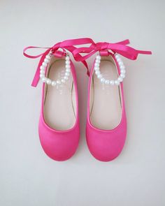 Satin flats with gorgeous row of pearls and rhinestones ankle strap for comfort and simple chic style. Perfect flower girls, birthday party, holiday, formal wear, or to match with your fall outfit. DETAILS: COLORS AVAILABLE: Black, Burgundy, Champagne, Fuchsia, Dusty Pink, Hunter Green, Ivory, Lavender, Light Blue, Navy, Red, White UPPER: Synthetic upper and lining MATERIALS: Manmade outsole ORIGIN: Imported STYLE NAME: HARPER Not sure of which size to purchase? Shoes measurements are as follow: (Please note measurements taken the length of inside of shoe from toe to heel) KIDS SIZES: Walker: - Size 4: 4.85 inches - Size 5: 5.15 inches - Size 6: 5.5 inches Toddler: - Size 7: 5.85 inches - Size 8: 6.15 inches - Size 9: 6.65 inches - Size 10: 6.85 inches - Size 11: 7.35 inches - Size 12: 7.5 Kids Pink Heels, Pink Kid Heels, Pink Satin Mary Jane Heels, Fall Flower Girl, Flower Girls Shoes, Simple Chic Style, Birthday Shoes, Flower Girl Shoes, Barbie Wedding