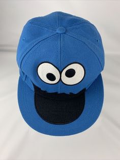 Cookie Monster Official Sesame Street Blue Baseball Cap Fitted Size S / M Hat. Some wear on inside head band Blue Streetwear Hat One Size, Blue Cotton Flat Brim Baseball Cap, Casual Blue Flat Brim Baseball Cap, Fun Blue Snapback Hat With Flat Brim, Blue Fun Style Snapback Hat, Blue Curved Brim Hip Hop Hat, Blue One Size Fitted Hat With Flat Brim, Playful Blue Cotton Hats, Blue Fitted Hat With Flat Brim, One Size