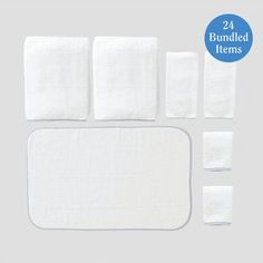 four pieces of white cloth with one piece cut out