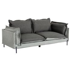 a gray couch with two pillows on it's back and one arm facing the camera