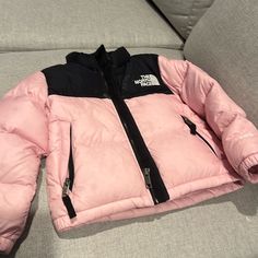 The North Face Retro 1996 Retro Nuptse Coat. Used 3t. Pink And Black Used. Pink And Black North Face Puffer, Christmas Girly Wishlist, Pink North Face Jacket Outfit, Pink Hooded Puffer Jacket For Outdoor Activities, Pink Puffer Jacket For Winter Outdoor Activities, Pink Hooded Puffer Jacket For Streetwear, Pink Puffer Jacket For Outdoor Activities, Pink Winter Puffer Jacket For Outdoor Activities, Sporty Pink Hooded Puffer Jacket