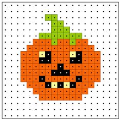 an orange and black pumpkin is shown in the middle of a cross stitch pattern on a white background