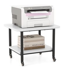 a printer sitting on top of a white table