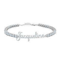 Timeless elegance made just for you! Your name is elegantly personalized on this stunning bracelet! Sparkling with 38 stunning simulated diamonds totaling over 6.5 carats. Beautifully presented, your bracelet will arrive in our signature keepsake pouch. Elegant Personalized Silver Name Bracelet, Elegant Silver Personalized Name Bracelet, Personalized Round Cubic Zirconia Bracelets, Personalized Cubic Zirconia Bracelets, Elegant Customizable Name Bracelet For Personalized Gift, Customizable Elegant Name Bracelet For Personalized Gift, Elegant Named Cubic Zirconia Jewelry, Customizable Name Bracelet For Personalized Gift, Personalized Silver Diamond Bracelet