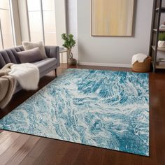 a blue and white rug in a living room