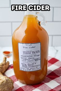 a jar of fire cider sitting on top of a table