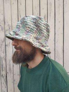 "Crochet Bucket Hat Man / Women. Unisex bucket hat made of cotton mix. These hats are so colorful that they can never be done the same 🤗 So... you will have a unique piece! They are suitable for spring and autumn weather. The yarn is soft. You can wash it in the washing machine with cold water. Size S/M fits well small heads (54-56cm / 21\"-22\") Size M/L fits well standard heads (57-59cm / 23\") Size XL fits well with a larger noggin (60-62cm / 24\") Yarn: Mix of cotton and acrylic Don't hesitate to get in touch with me for a custom order or if you need any further information. If you want a hat in a custom color, you should write the color you want in the order note or just contact me. I will send you all available variants for your choice. Thank you for visiting my shop ❤️ Polina ❤️" Bucket Hat Crochet Men, Crochet Bucket Hat For Men, Crochet Bucket Hat Men, Men Bucket Hat, Diy Baby Bows Headbands, Crochet Mens, Diy Baby Bows, Rave Hats, Women Bucket Hat