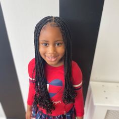 young girl in a red sweater spotting a knotless curly tipped braids Children Knotless Braids, Kids Single Braids, Kids Knotless Box Braids, Kids Knotless Braids, Knotless Braids Kids, Kids Hairstyles Girls Black, Knotless Braids For Kids, Black Braid Styles