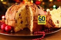 a large loaf of bread on a plate with christmas decorations