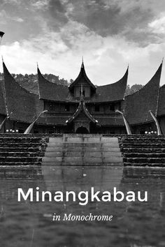 black and white photograph of stairs leading up to a building with the words minangkabau in monochrome