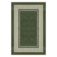 a green rug with white border