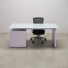 a white desk with a black chair in front of it and a gray wall behind it