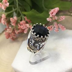 "Black Onyx Solid 925 Sterling Silver Artisan Crafted Filigree Paisley Ring Material: 925 Solid Sterling Silver Ring Face : 0.55\" round Genuine Black Onyx Stone: 12 mm Round, Faceted, Approximate Total Carat Weight: 5 Comes with a free gift box Free Domestic Shipping For this particular ring if desired we can change the stone to your favorite gem stone at a reasonable cost. Excellent quality, have sold in the USA, Canada, Italy, Germany and the UK, and received hundreds five star reviews. The s Black Jewelry With Gemstone Accents For Gift, Ornate Black Rings As Gift, Ornate Black Rings For Gifts, Ornate Black Rings For Gift, Black Intricate Design Jewelry As Gift, Black Jewelry With Stone Setting For Gift, Black Rings With Gemstone Accents As Gift, Black Rings With Gemstone Accents For Gift, Ornate Black Jewelry For Gift