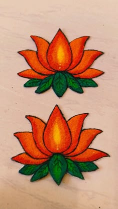 two orange flowers with green leaves on them