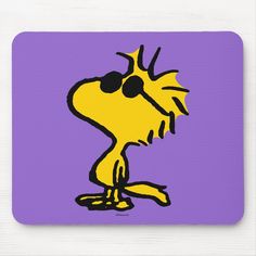 a cartoon dog with big eyes on a purple mouse pad