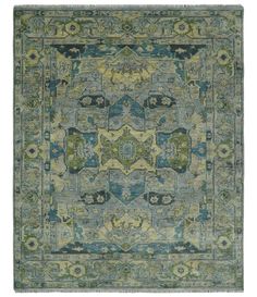 an area rug with blue, green and yellow colors