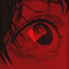 an eye is shown with red light coming from the iris's reflection in it