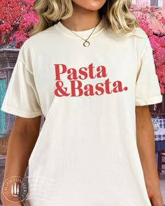 "Indulge in Italian charm with our adorable \"Pasta e Basta\" t-shirt collection! 🍝✨ Explore the magic of Italy right on your tee, available in a palette of vibrant and neutral colors to suit every mood.  Perfect for pasta lovers and those who appreciate the simple joys of life!   Embrace the cuteness, choose your favorite hue, and let the world know that when it comes to pasta, it's all about simplicity - \"Pasta e Basta\"!  #ItalianCharm #PastaLovers  #PastaeBasta #ItalianInspiration .: Made to order / Made on demand .: This unisex tee is an excellent, all-season wear thanks to its medium fabric (6.0 oz/yd² (203 g/m. Made with 100% US cotton, this tee guarantees long-lasting comfort and style.  .: The classic fit along with the crew neckline make it a highly versatile choice for casual Italia T Shirt Outfit, Italian Food Pasta, Vintage Italian Pasta Posters, Italian Shirts Funny, Pasta Shirt, Food Quote, Joys Of Life, Italian Shirts, Food Pasta