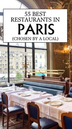 the restaurant in paris has blue booths and tables with white tablecloths