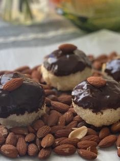 chocolate covered cookies with almonds on top