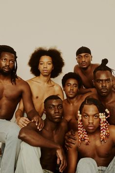 a group of black men posing for a photo