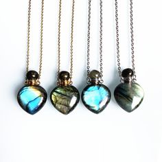 You will received one piece Heart Shaped Labradorite Gemstone Perfume Bottle pendant necklace Beautiful flash color. blue, green, yellow, send by random. Pendant size: 22mmx33mm Metal: Stainless Steel with gold plated or Steel color Necklace length: 20 inches Necklace material: steel with gold plated, steel with silver plated Thank you contact us if also have any question :) Love Quartz, Heart Healing, 20 Inch Necklace, Bottle Pendant, Color Necklace, Quartz Jewelry, Necklace Heart, Labradorite Stone, Jewelry Silver