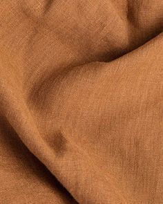 a close up view of a brown fabric