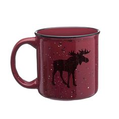 a red coffee mug with a moose drawn on it's side and stars in the background