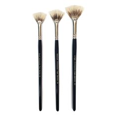 three brushes are shown side by side on a white background